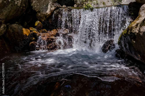 River in the mountains of Turkey. Waterfall among rocks.