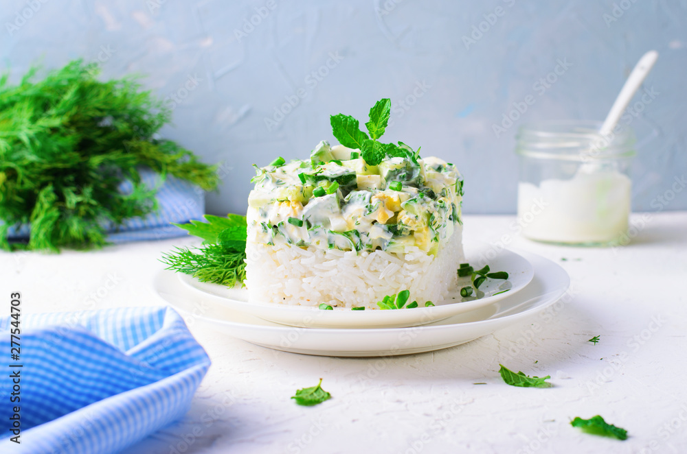 Rice Salad with Cucumbers, Eggs, Sour Cream and Herbs