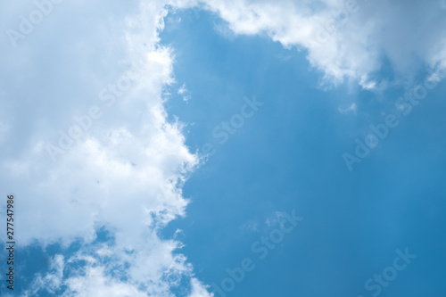 blue sky background with white clouds.Independent concept. © chatchawan