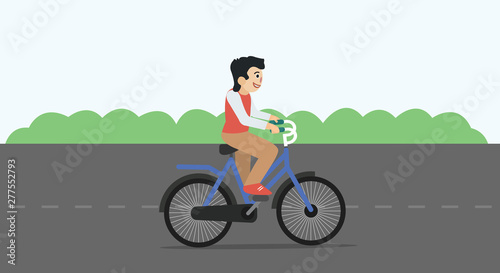 Smiling man on bicycle driving on summer beach background.