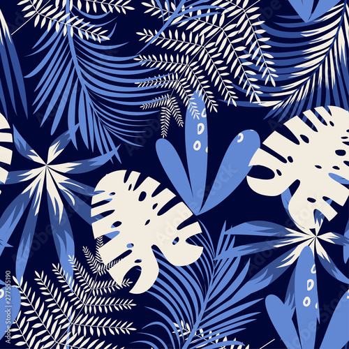 Trending bright seamless background with colorful tropical leaves and plants on dark background. Vector design. Jungle print. Floral background. Printing and textiles. Exotic tropics. Fresh design.