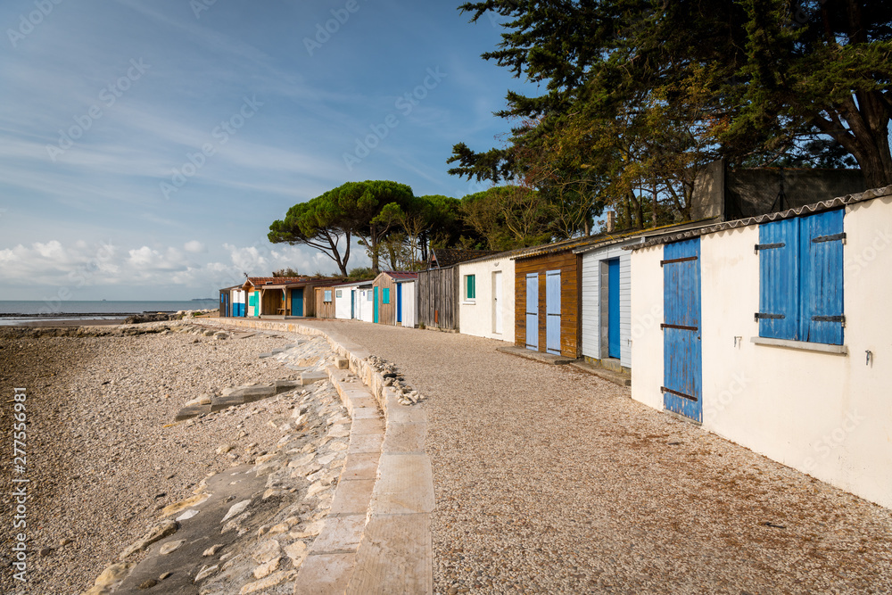 Fototapeta premium tiny colorful houses made of wood on the beach