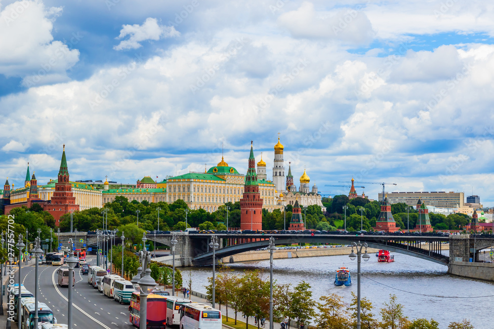 View of the Moscow River and the Moscow Kremlin with golden domes of cathedrals. Moscow, Russia.