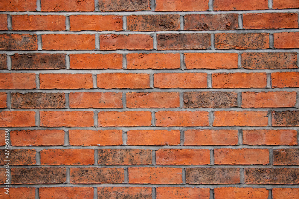 Fototapeta premium Orange brick wall surface background texture