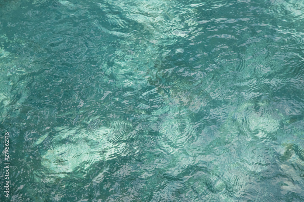 High-resolution background of turquoise water surface High-resolution background of turquoise water surface
