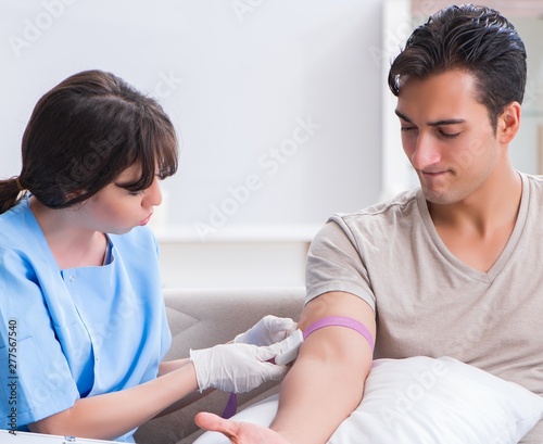 Patient getting blood transfusion in hospital clinic