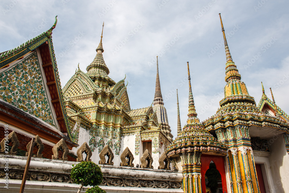 Fototapeta premium Famous giants infront of Wat Pho gate , Wat Pho , Bangkok, Thailand