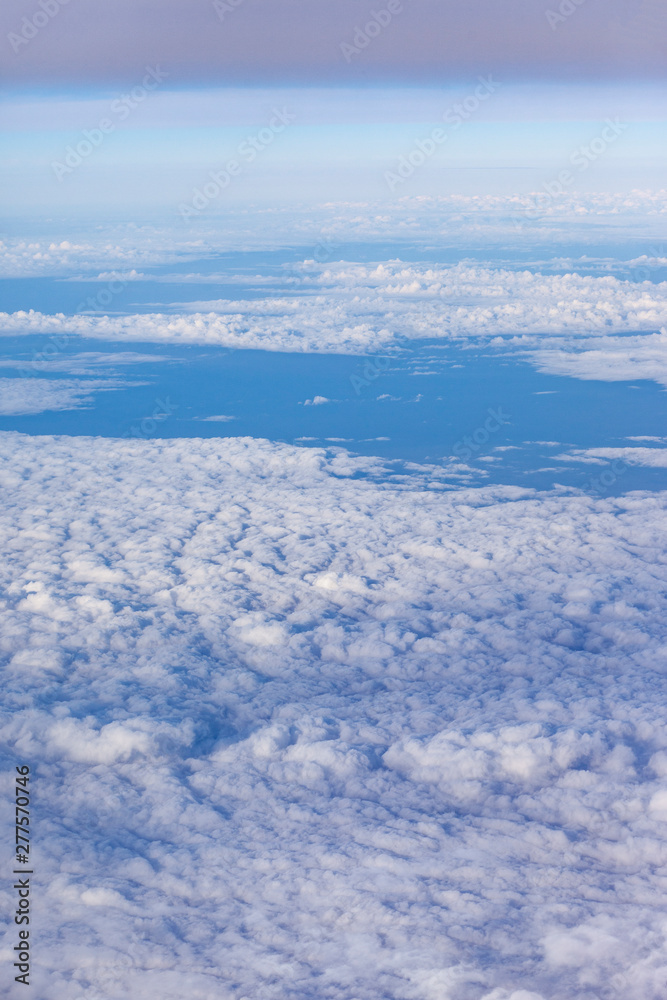 landscape above white clouds