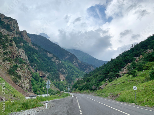 Russia, North Ossetia. Kassar gorge in summer in cloudy weather photo