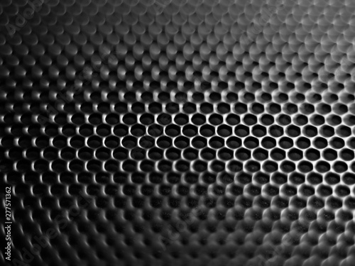 Minimalistic selective focus, black mesh background for modern technology concepts and ideas.