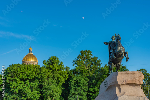 Peter the First on the background of the dome of St. Isaac's Cathedral in St. Petersburg