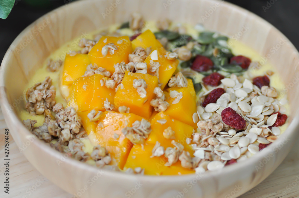 smoothie bowl,mango yogurt with fruit topping