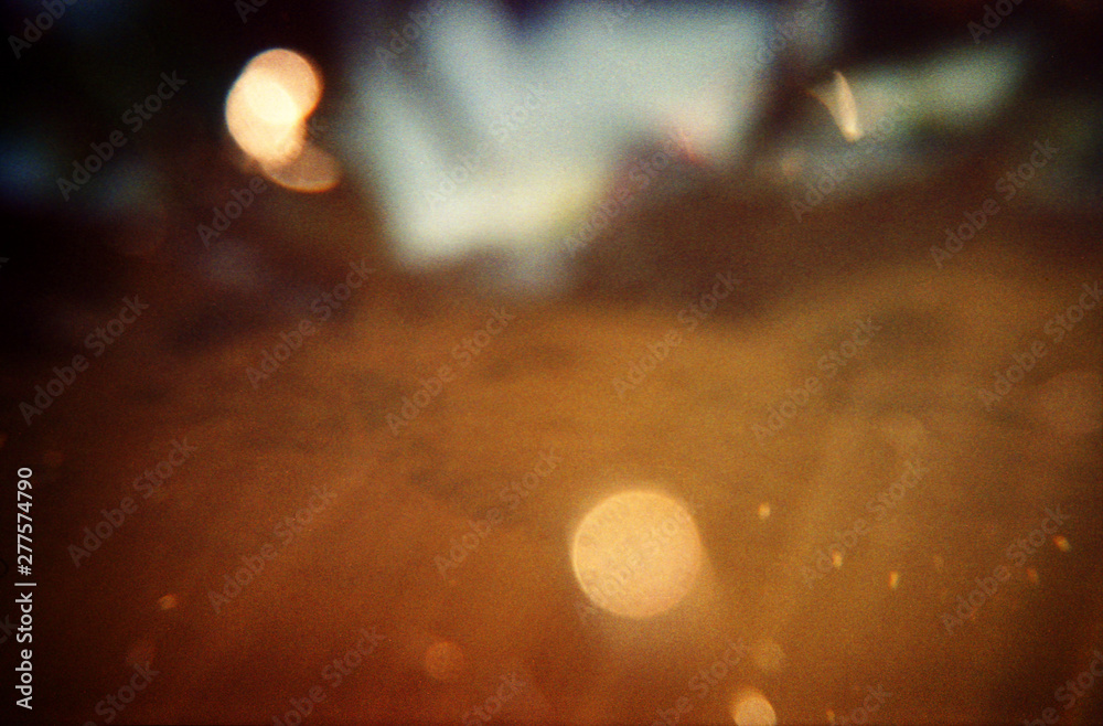 Abstract underwater view of shore and sky shot on film