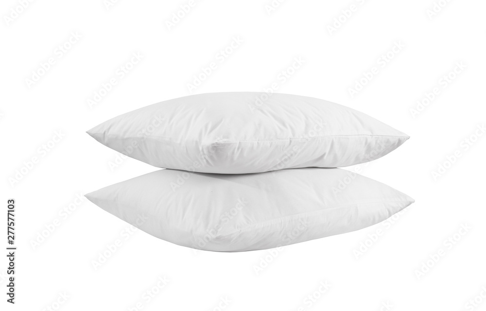 Two white pillows isolated, pillows on a white background, two pillows piled against white background. Side view.