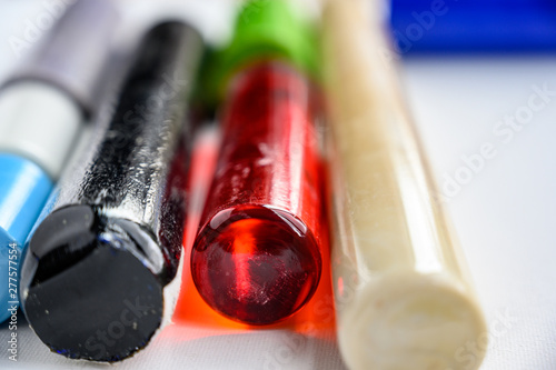 Assorted bar stock of translucent and opaque supplies for glass blowing