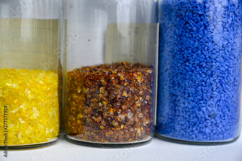 Jars of pulled cane and frit glass blowing supplies