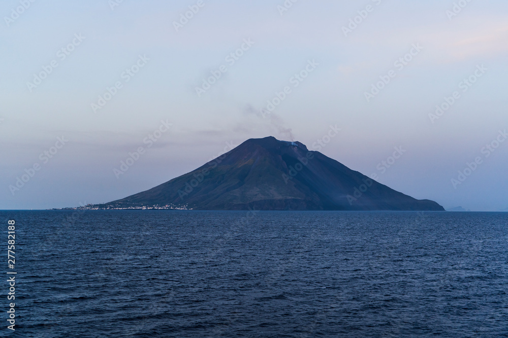 The majestic Eolian island of Stomboli view from the sea, active volcano in Italy The majestic Eolian island of Stomboli view from the sea, active volcano in Italy