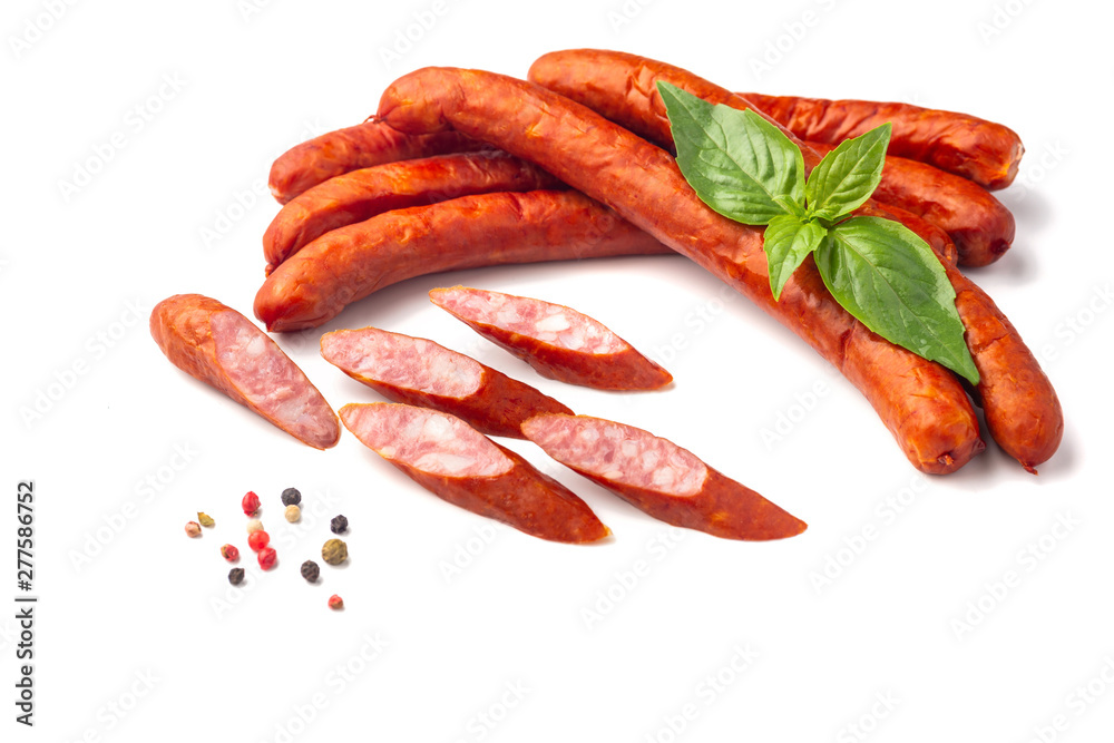 Smoked bratwurst Pork Sausages with basil leaves, close-up, isolated on white background. Smoked bratwurst Pork Sausages with basil leaves, close-up, isolated on white background.