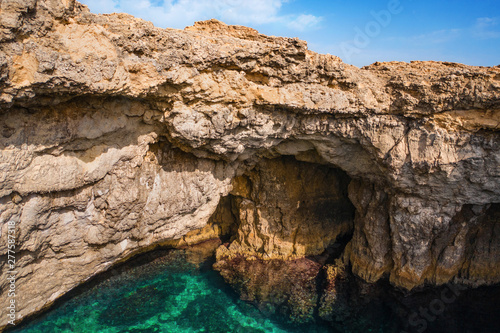 Big natural hole in the rock. Coral Lagoon. Mellieha. Maltese nature