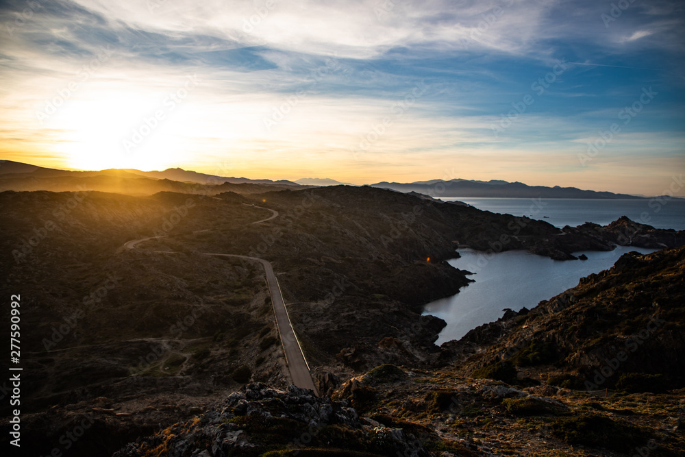 Sunset and a curved road view in Cap de Creus, Catalunya