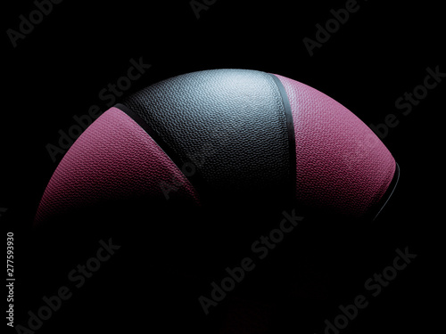 Magenta and black modern basketball ball for men or women on black background. © Martin Piechotta