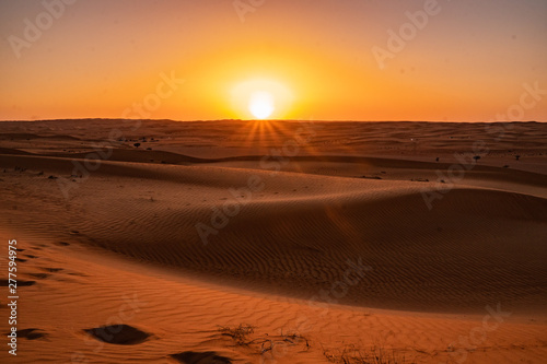 Sunset in the Wahiba Sands desert in Oman