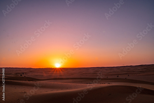 Sunset in the Wahiba Sands desert in Oman