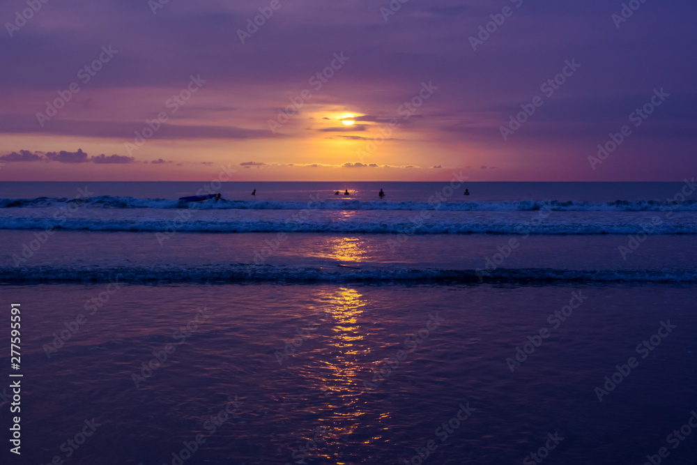 Sunset at Kuta Beach on the island of Bali in Indonesia.