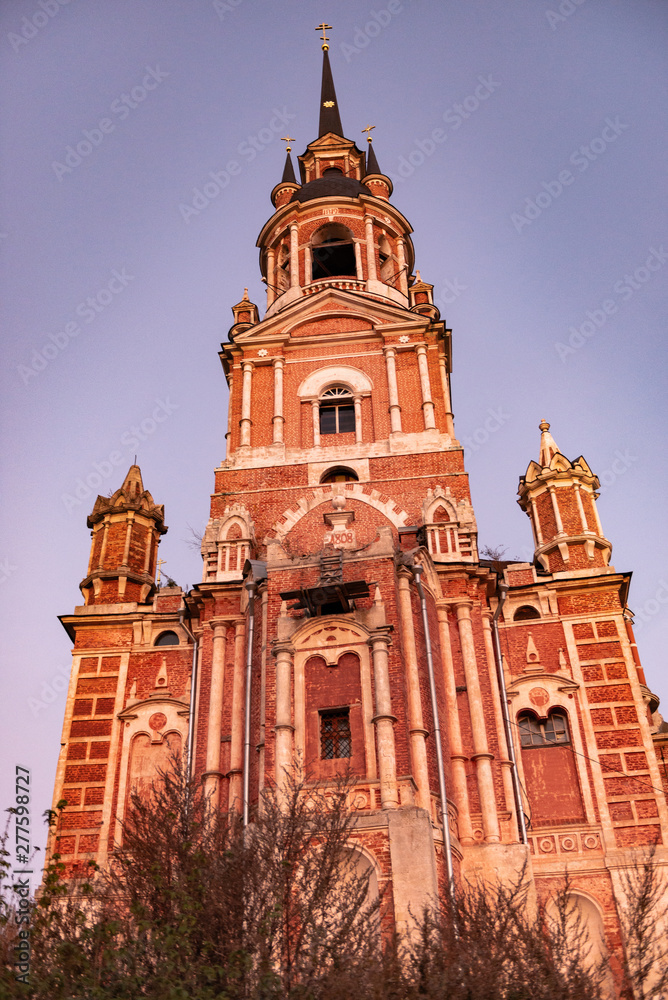 Gothic Orthodox Cathedral. Neo-Gothic Orthodox Church with Masonic symbols. Church at sunset.