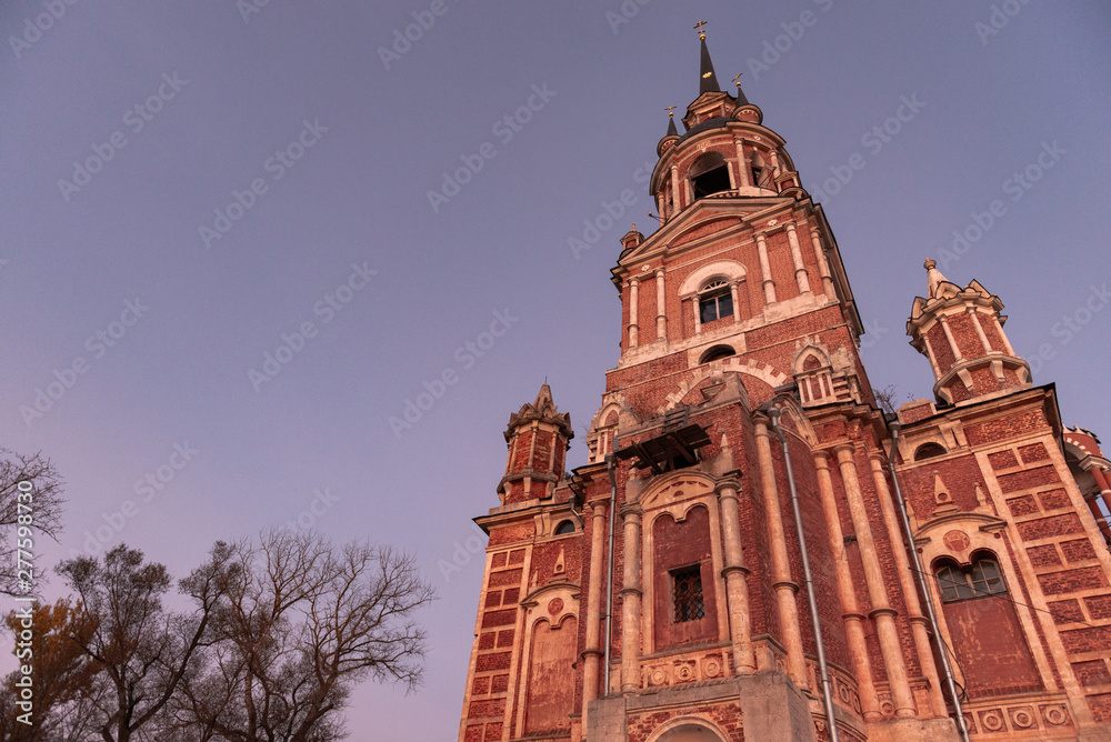 Gothic Orthodox Cathedral. Neo-Gothic Orthodox Church with Masonic symbols. Church at sunset.