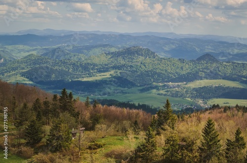 Beautiful mountain spring landscape. Picturesque valley and green hills.