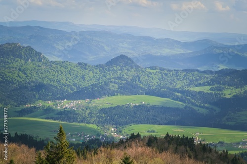 Fototapeta Naklejka Na Ścianę i Meble -  Beautiful mountain spring landscape. Picturesque valley and green hills.