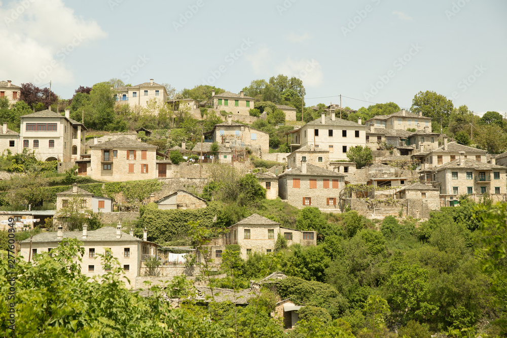 Ioannina village Vitsa in spring season old tranditional houses and green trees
