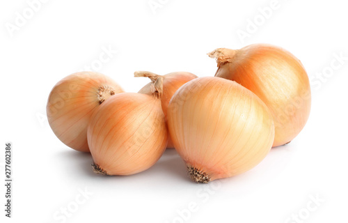 Fresh ripe onion bulbs on white background