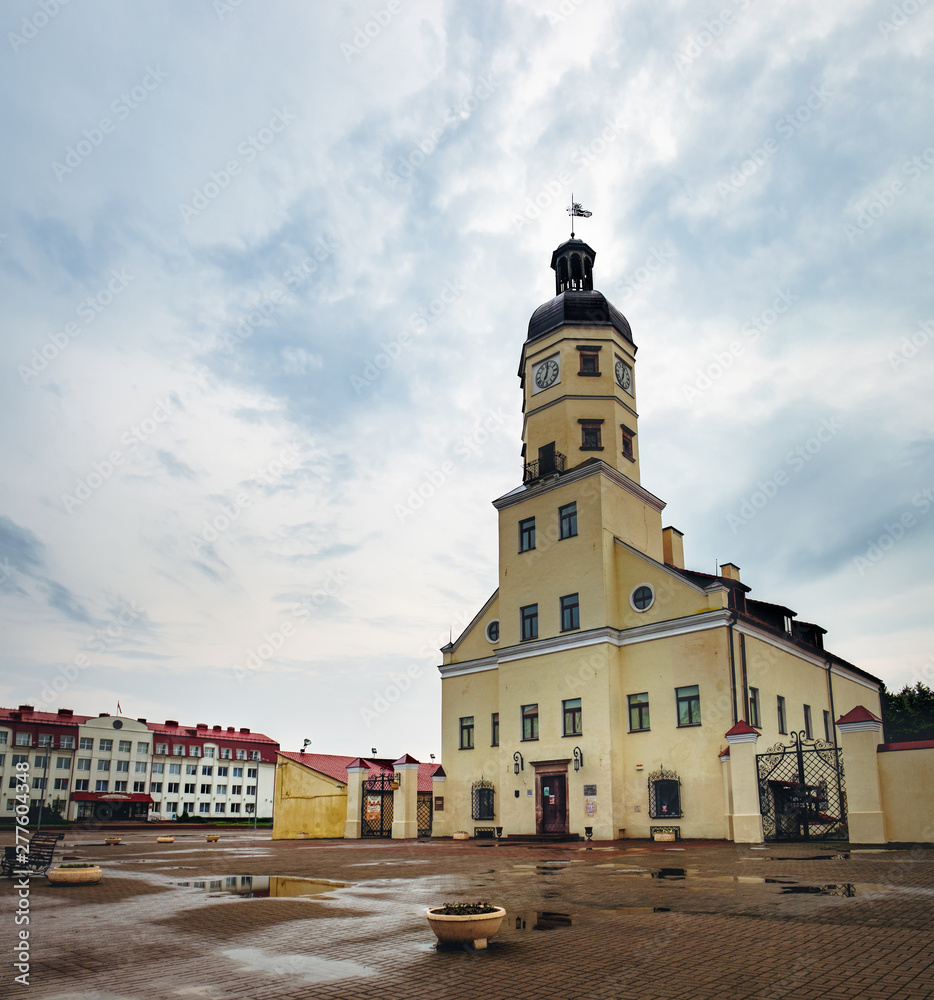 Panoramic view of Square and old Town Hall in summer rainy day, Nesvizh, Minsk Region, Belarus