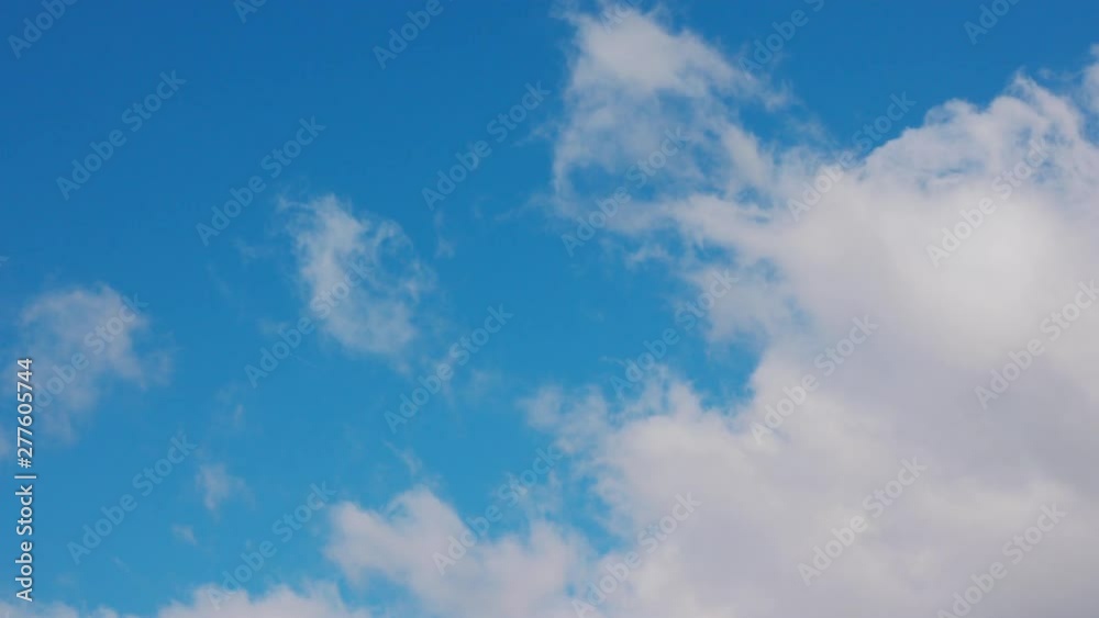 White clouds floating in the blue sky. White clouds floating in the blue sky.