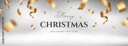 Merry Christmas vector design. White golden background with flying gold confetti and congratulations text. Elegant festive decoration, long panoramic gift card or wide web banner layout template