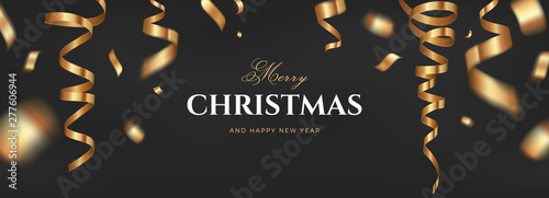 Merry Christmas vector banner design. Black golden background with flying gold confetti and congratulations text. Elegant festive decoration, long panoramic gift card or wide web layout template
