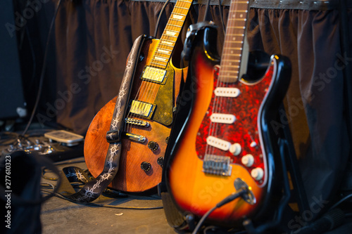 Fototapet Two classic electric guitars ready to be played in a music studio