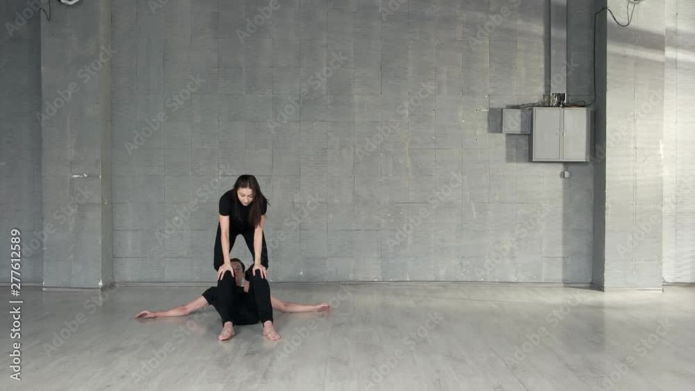 Young couple of dancers training in studio. People, choreography and lifestyle concept. Young couple of dancers training in studio. People, choreography and lifestyle concept.