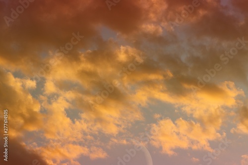 amazing colorful sun colored clouds in the sky for using in design as background.