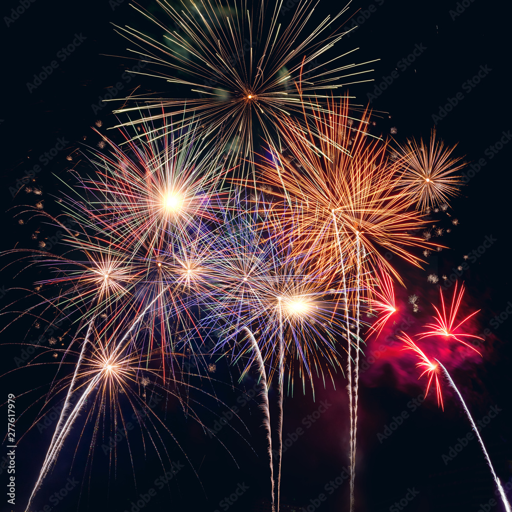 Happy new year 2020 with fireworks on dark background. Celabration festive new year firework headline or bannner.