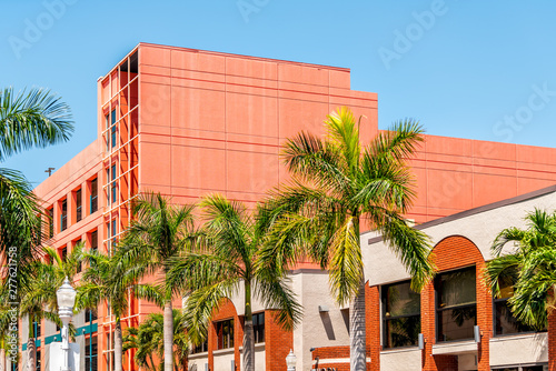 Fort Myers city during sunny day in Florida gulf of mexico coast shopping restaurants and closeup of spanish orange architecture photo