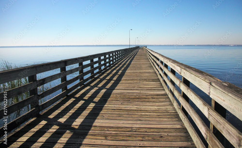 A Pier approaches the Horizon over the St. Johns River in Switzerland, Florida