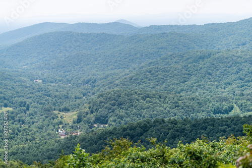 View of trees in Shenandoah Blue Ridge appalachian mountains on skyline drive overlook and rolling hills