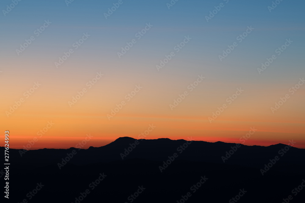 Mountain panorama during sunrise. Beautiful natural panoramic landscape in the summer time