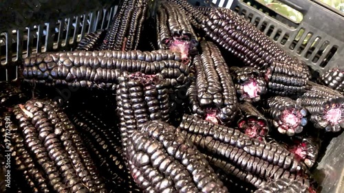 Black corn in detail, in supermarket box, Maíz Morado photo