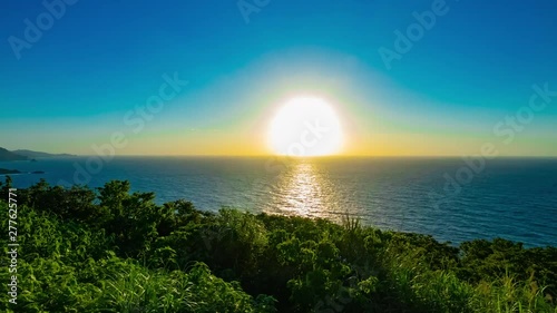 A timelapse of sunset at the panoramic ocean at Mineyama promontory in Amami oshima Kagoshima zoom photo
