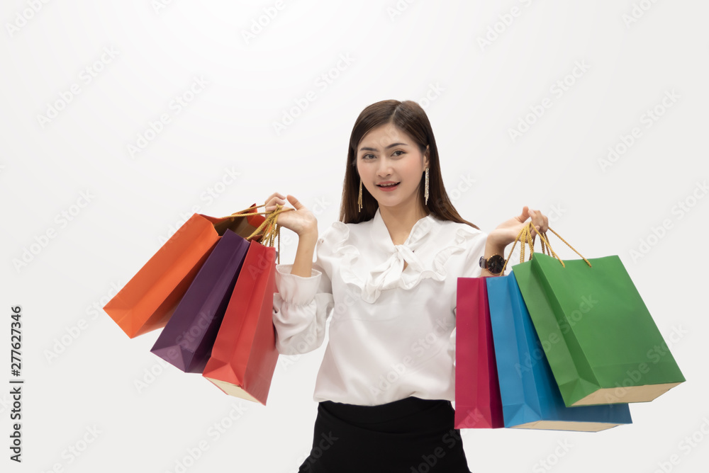 Woman Holding Shopping Bag Against White Background.
