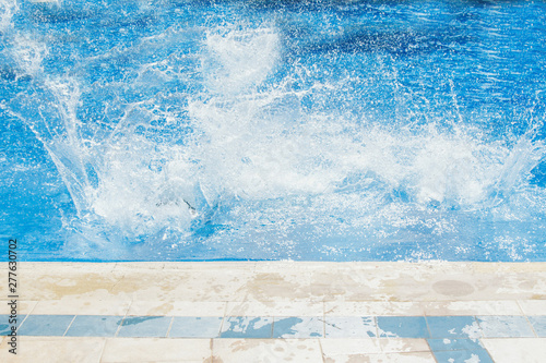 splashes of blue water in the pool close-up © aaalll3110